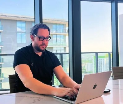 Nathan Bentley working at his desk
